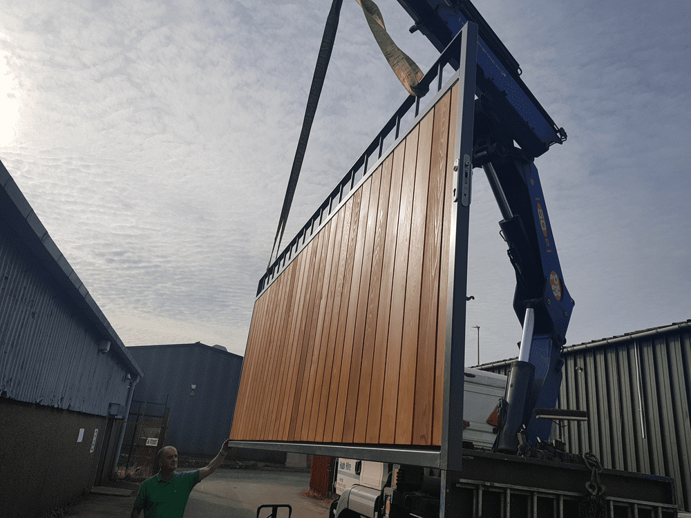 Metal framed timber cedar gates